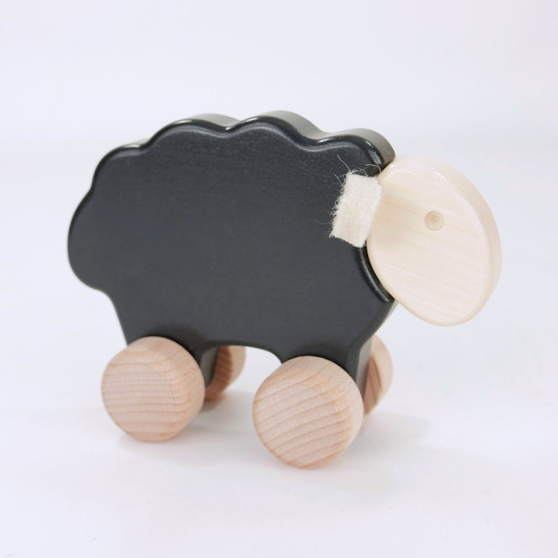 BAJO Schwarzes Schaf auf Rädern